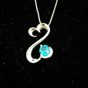 Sterling Silver Jane Seymour Open Heart Necklace With Blue Topaz Stone